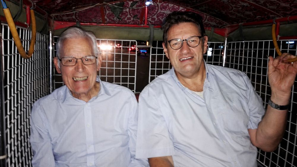 Robert Glover and Lord Laming together on a trip